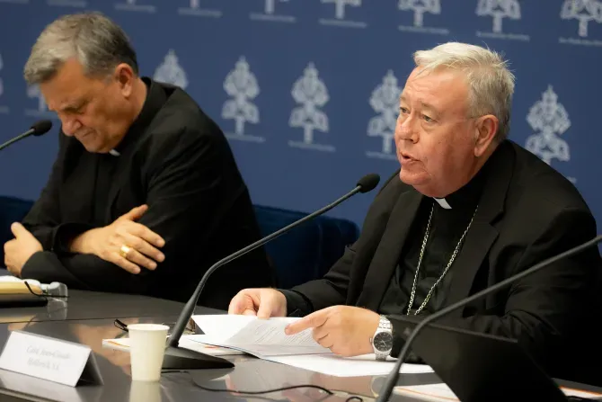 Cardinal Jean-Claude Hollerich (right), relator general of Synod on Synodality, speaks to the media on June 20, 2023, at the temporary headquarters of the Holy See Press Office in Vatican City. Beside him is Cardinal Mario Grech, the Secretary General for the Synod of Bishops. | Daniel Ibáñez/CNA
