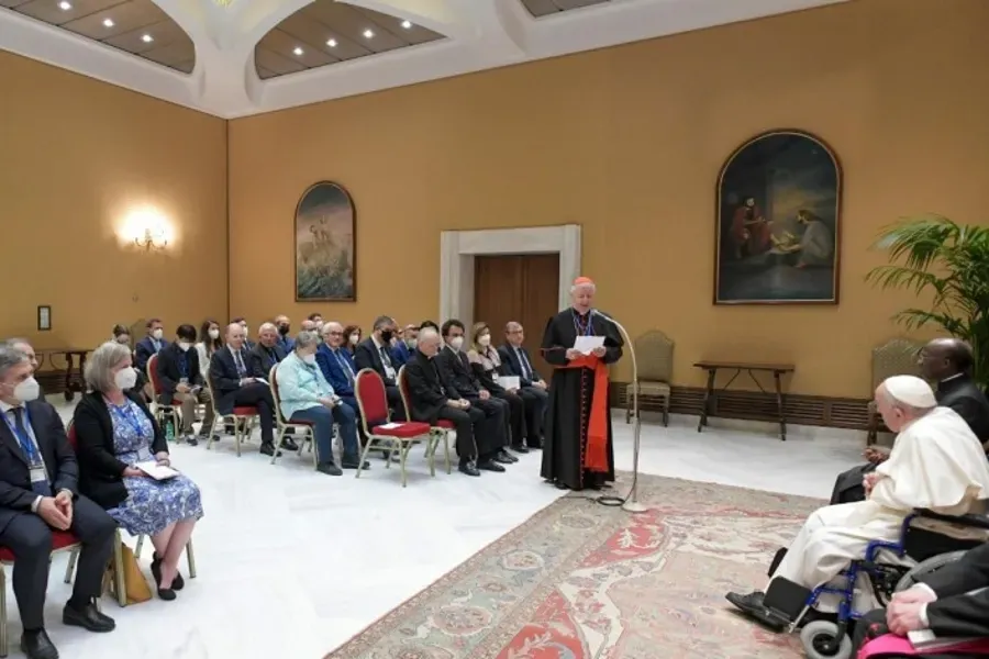 Pope Francis meets participants in the international conference ‘Lines of Development of the Global Compact on Education’ in a room adjacent to the Vatican's Paul VI Hall, June 1, 2022. Vatican Media.