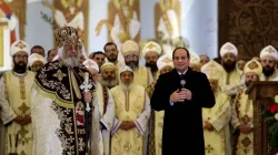 Egyptian President Abdel Fattah al-Sisi speaks near Tawadros II during a Liturgy at Nativity of Christ Cathedral in Egypt's administrative capital, Jan. 2, 2020. Credit: STR/AFP via Getty Images.