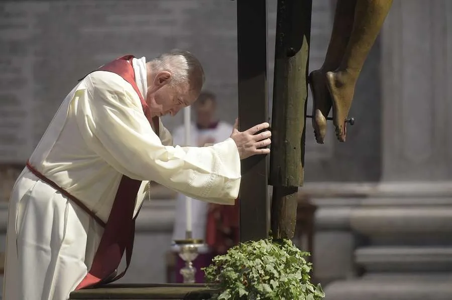 Pope Francis prays by the crucifix in St. Peter's Basilica April 10, 2020. Credit: Vatican Media.