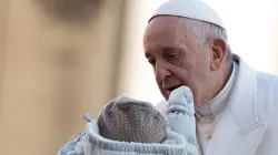 Pope Francis blesses a baby at the General Audience in St. Peter's Square on Nov. 22, 2017. Daniel Ibanez/CNA.