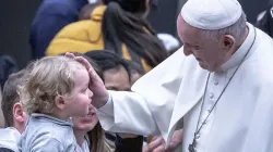 Pope Francis blesses a child on Jan. 12, 2020. Credit: Daniel Ibanez/CNA.