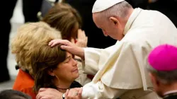 Pope Francis blesses a woman at a general audience in Paul VI Hall Dec. 5, 2018. Credit: Daniel Ibanez/CNA.