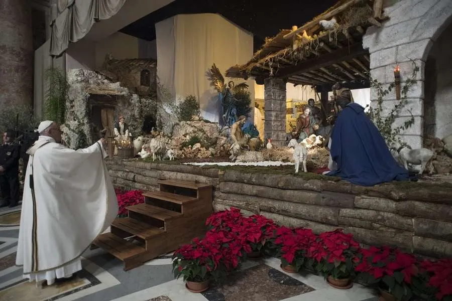 Pope Francis incenses the nativity scene in St. Peter's Basilica Dec. 24, 2017. Credit: Vatican Media.
