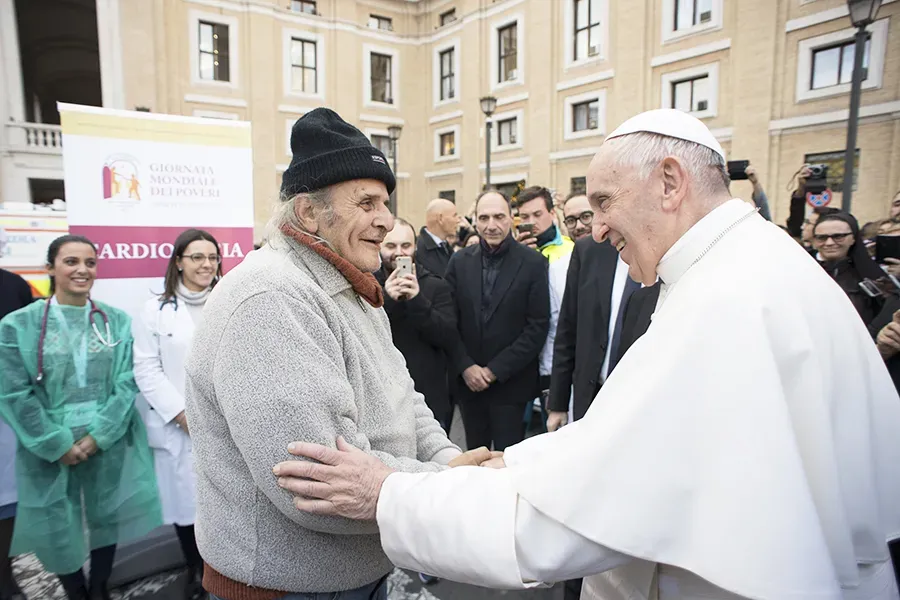 Pope Francis greets a participant in the World Day of the Poor in Rome, Nov. 16, 2017. L'Osservatore Romano.