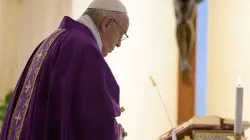 Pope Francis prays in the chapel of Casa Santa Marta March 23, 2020. Credit: Vatican Media