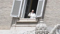 Pope Francis waves from a window of the apostolic palace May 10, 2020. Credit: Vatican Media.