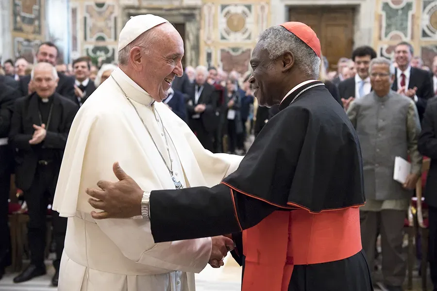 Pope Francis with Cardinal Peter Turkson, prefect of the Dicastery for Promoting Integral Human Development, in the Vatican, Nov. 10, 2017. L'Osservatore Romano.