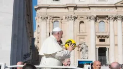 Pope Francis holds a soccer ball in St. Peter's Square in 2015. Credit: Vatican Media.