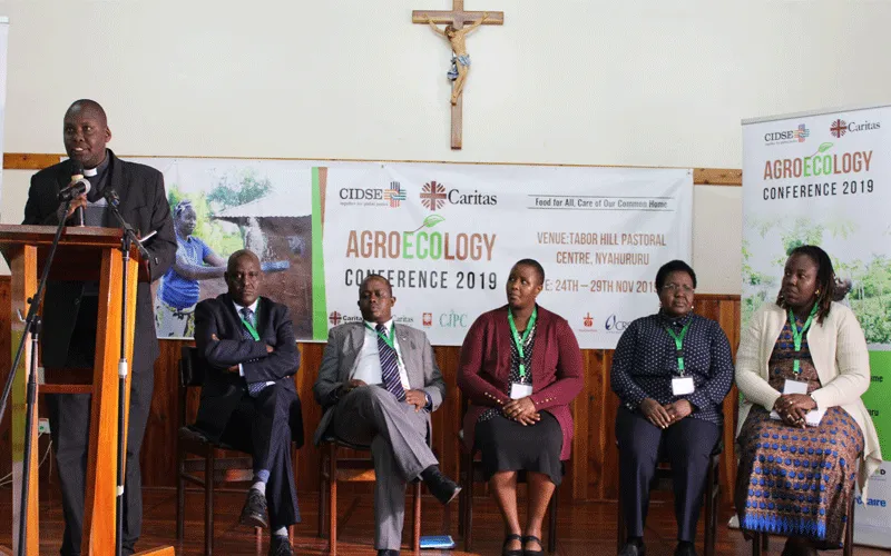 Fr. John Nene (standing - Caritas Nyahururu); From left: Stephen KItuku (Caritas Kenya), Dennis Kioko (Trocaire), Stellamaris Muelar (Fastenopfer), Margaret Mwaniki (Caritas Africa), and Hellen Owiti (Trocaire) / ACI Africa