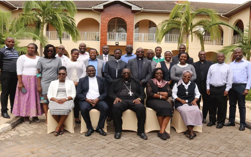 Group photo of National Conferences and AMECEA Secretariat staff of Promotion of Integral Human Development and Social Communications departments, with Bishop Moses Hamungole (Front row centre). / AMECEA secretariat/ Facebook