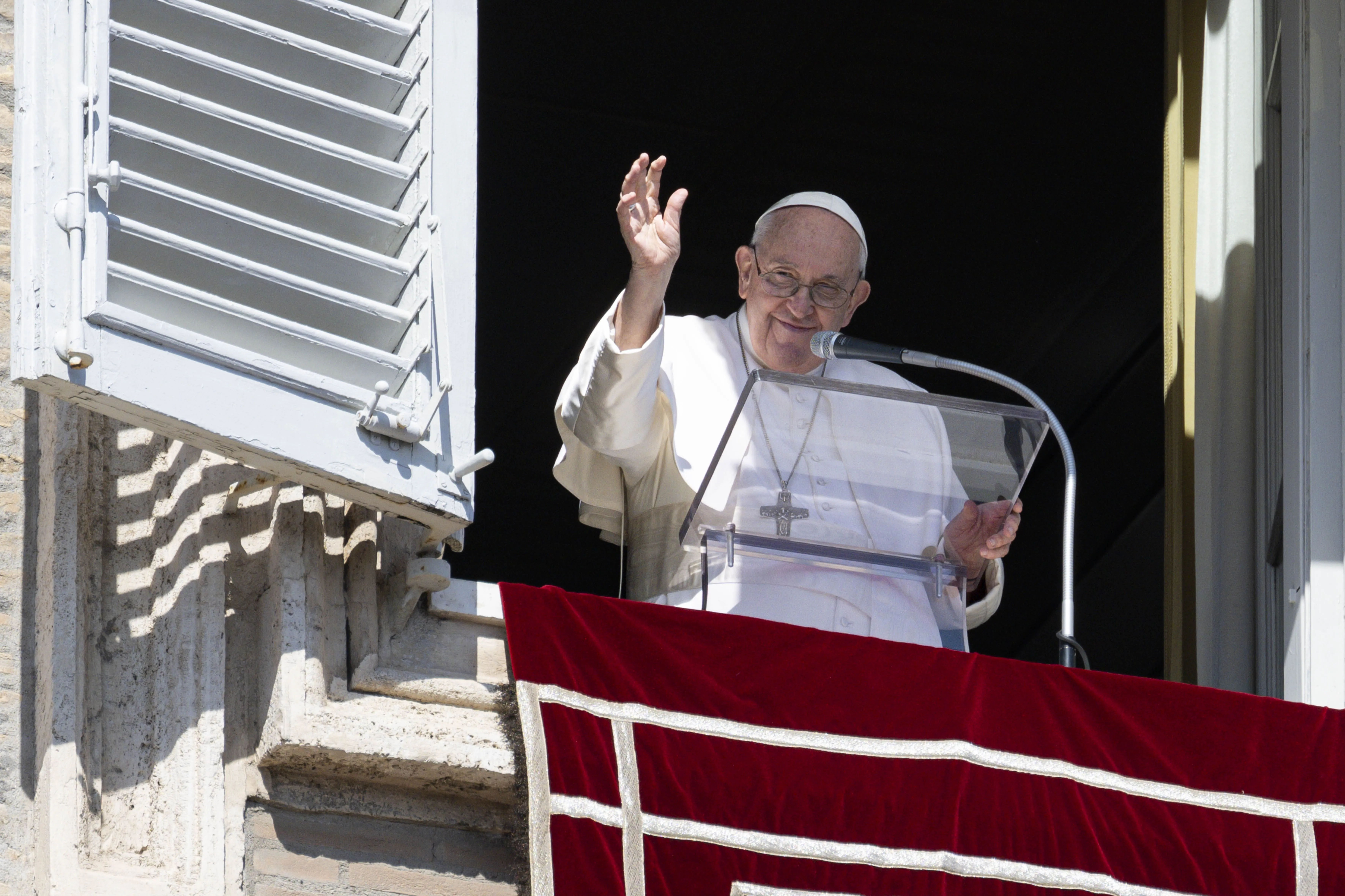 Pope Francis waves to the crowd in St. Peter's Square on March 5, 2023