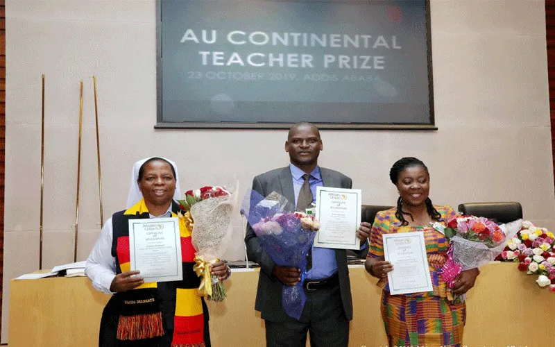 Top three African teachers, from left Ugandan Sr.Gladyce Kachope, Kenyan Eric Ademba, and Ghanaian  Augusta Lartey-Young at the inaugural Continental Teacher Prize in Addis Ababa, Ethiopia on October 23, 2019 / African Union