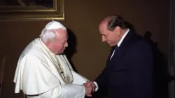 St. Pope John Paul II greets former Italian Prime Minister Silvio Berlusconi. | Vatican Media