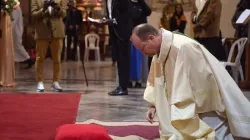 Bishop Nicolas Lhernould Lies Prostate On The Altar Steps during his Episcopal Ordination in Tunis, February 8, 2020.