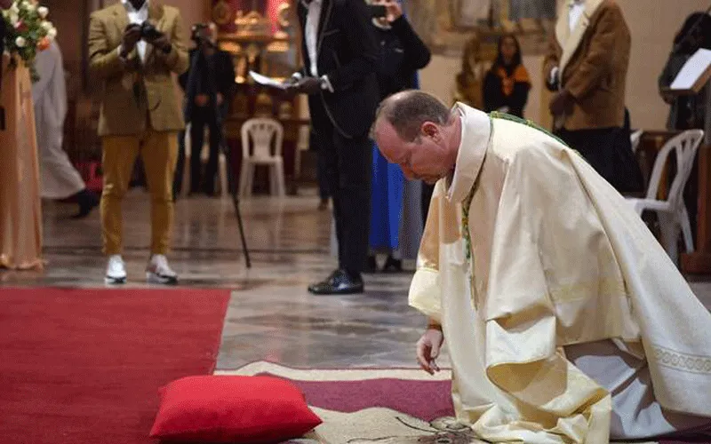 Bishop Nicolas Lhernould Lies Prostate On The Altar Steps during his Episcopal Ordination in Tunis, February 8, 2020.