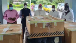 The Apostolic Nuncio in Liberia, Archbishop Dagoberto Campos Salas handing over the Pope's donation to the staff of St. Joseph Catholic Hospital of Liberia’s Monrovia Archdiocese. Credit: CABICOL/Facebook