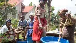 Supported by CAFOD, the Olame Centre women's group in the DR Congo are making detergent and soap to combat the spread of COVID-19. / Catholic Agency for Overseas Development (CAFOD)