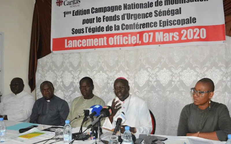 Archbishop Benjamin Ndiaye of Senegal's Dakar Archdiocese with members of Caritas Senegal at the press conference to Launch the Fuudraising campaign, Saturday, March 7, 2020.