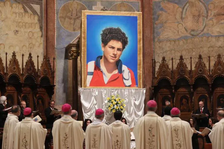 An image of Carlo Acutis was unveiled at his beatification Mass in Assisi, Italy Oct. 10, 2020. / Daniel Ibanez/CNA