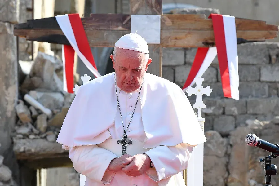 Pope Francis prays at Hosh al-Bieaa (Church square) in Mosul, Iraq, on March 7, 2021. Vatican Media.