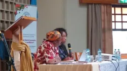 Sheila Pires, Secretary of the Synod on Synodality Commission for Information (on the right) makes a presentation at the delegates meeting in Nairobi, Kenya.  Credit: ACI Africa