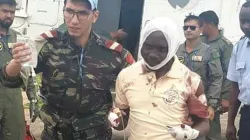 Injured Fr Guy-Robert Mandro being taken to hospital by officials of the United Nations Organization Stabilization Mission in the DRC (MONUSCO).