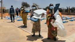 Some of the flood victims in Sudan receive aid provided by Cooperazione Internazionale (COOPI). / Cooperazione Internazionale (COOPI)