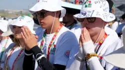 A group of South Koreans pray at World Youth Day 2023 in Lisbon, Portugal. | Credit: Almudena Martínez-Bordiú / ACI Prensa