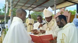 Archbishop Gabriel Mbilingi with Fr. Zeferino Bunta Kanima Muliepo during his ordination on 11 February 2024. Credit: Archdiocese of Lubango