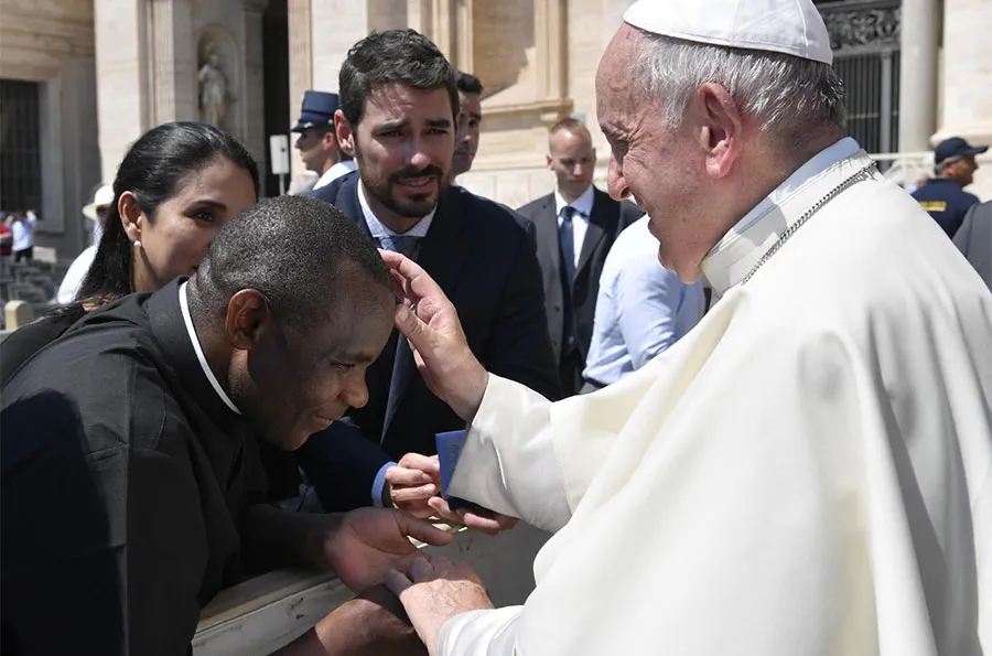 Pope Francis blesses Fr. Don Bosco Onyalla / Vatican Media