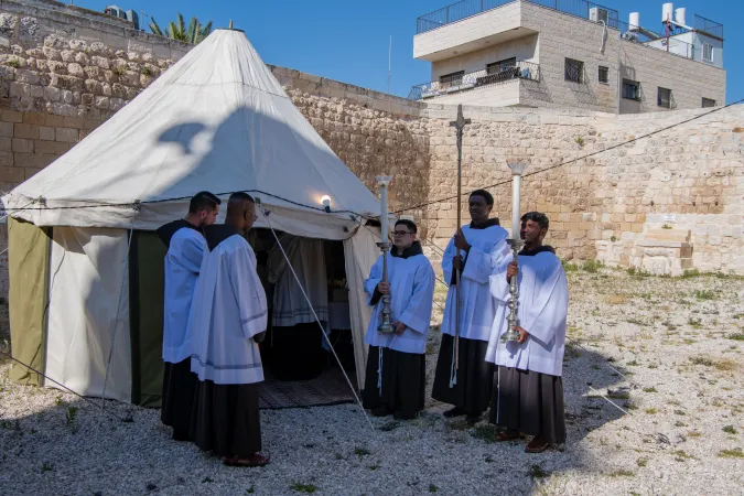 The Franciscan masters of ceremonies are preparing for the celebration outside the tent-sacristy set up in the area of the Chapel of the Ascension for the solemnity celebration on May 8, 2024. The Chapel is located on the Mount of Olives, in Jerusalem. Outside the chapel, four large tents were set up, erected that morning. They serve to accommodate the sacristy, pilgrims, and a small field kitchen.