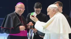 Pope Francis holds a puzzle cube during his meeting with young people at a sports arena in Budapest, Hungary, on April 29, 2023. | Vatican Media