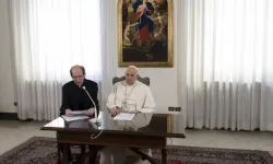 Papal aide Monsignor Paolo Braida reads Pope Francis' prepared remarks for the Sunday Angelus on Dec. 3, 2023, from the chapel at the papal residence at Casa Santa Marta. | Vatican Media