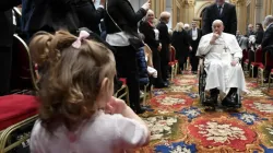 Pope Francis engages with a youngster at the inauguration of the 95th Judicial Year of the Vatican City State on Saturday, March 2, 2024. | Credit: Vatican