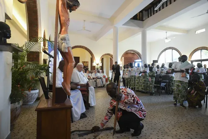 Young people from eastern Congo lay down the machetes and knives used to kill their families at the foot of Christ’s cross to symbolize their forgiveness in a moving encounter with Pope Francis during his trip to the country Feb. 1, 2023. | Vatican Media
