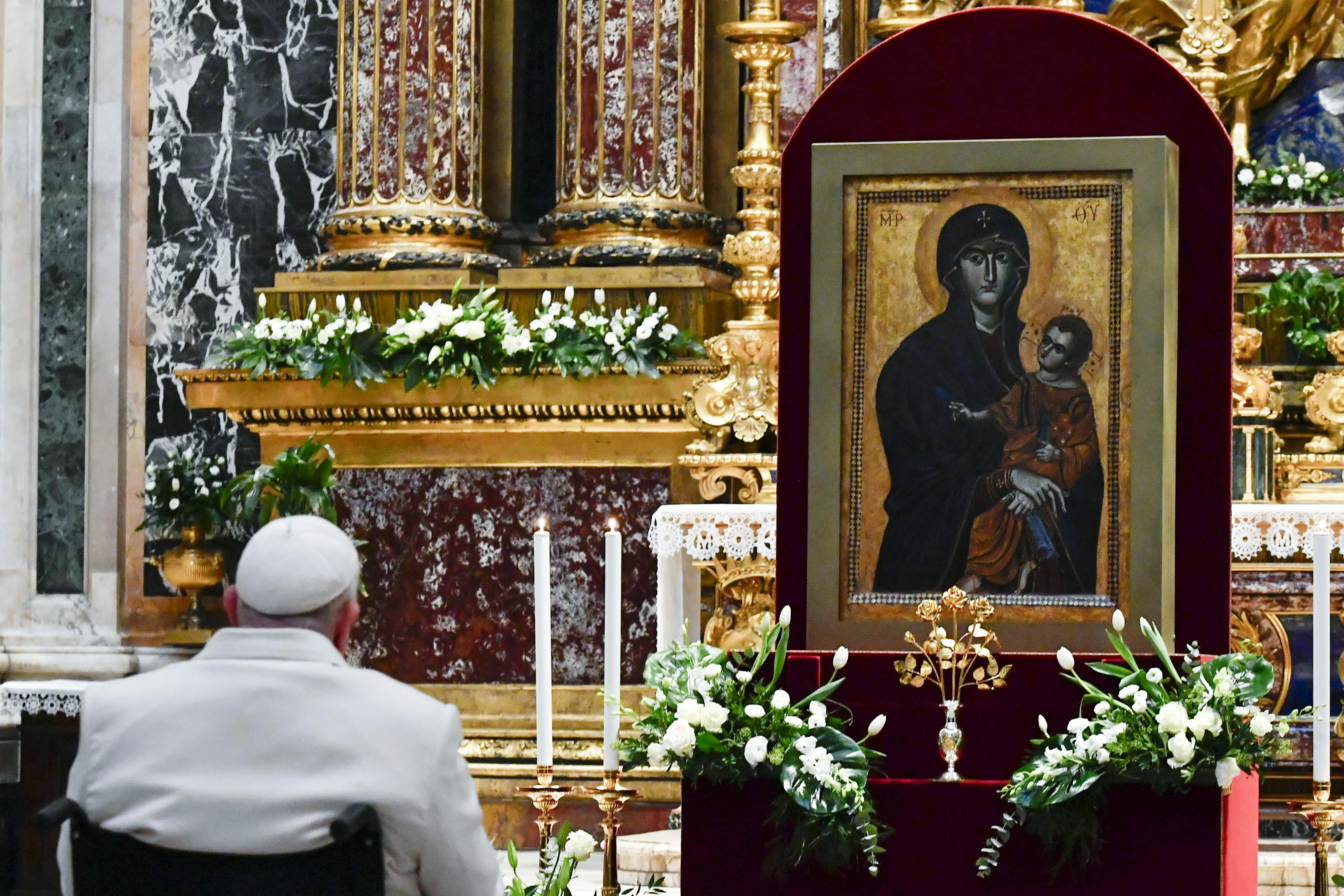 Pope Francis venerates the Salus Populi Romani icon in the Basilica of St. Mary Major on Dec. 8, 2023.