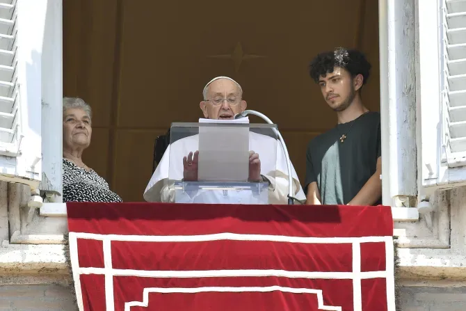 Pope Francis is flanked by a grandmother and grandson during his Angelus reflection on July 23, 2023, in honor of the World Day for Grandparents and the Elderly. | Vatican Media
