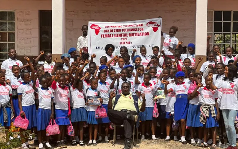 Fr. Peter Konteh (seated), poses for a photo session with beneficiaries of Desert Flower Foundation- Sierra Leone on the celebrations of International Day of Zero Tolerance for Genital Mutilation. Credit: Fr. Peter Konteh