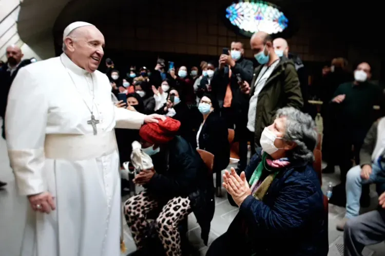 Pope Francis marks name day with Rome’s poor receiving COVID-19 vaccine./ Vatican Media