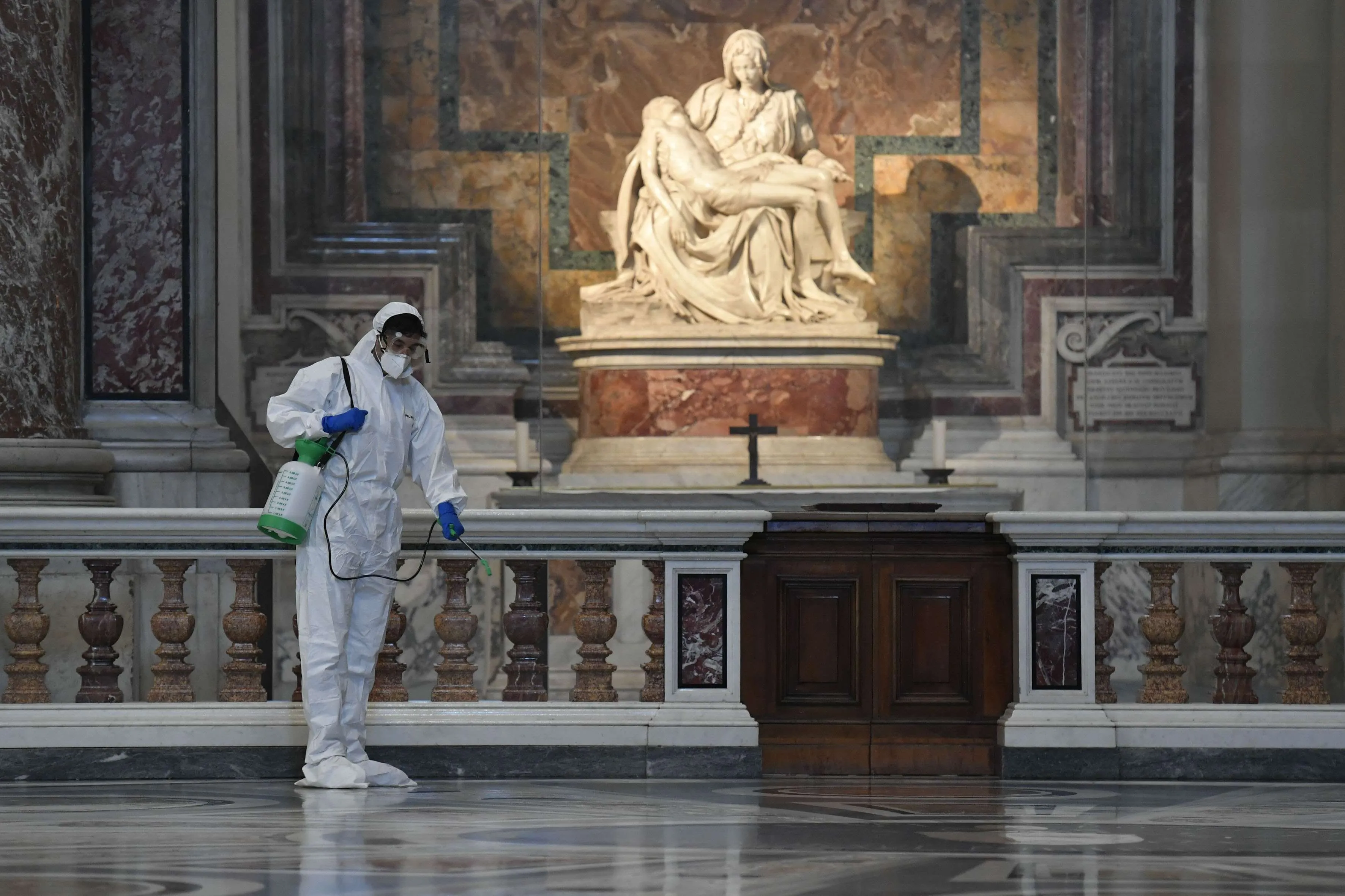 A worker cleanses St. Peter's Basilica ahead of its reopening. Credit: Vatican Media (all photos)