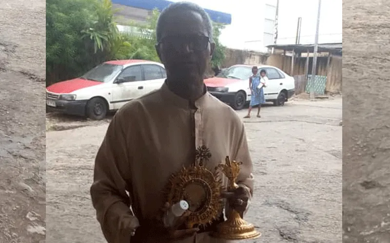 Fr. Benedict Dieme with Monstrance, Lunette Containing Body of Christ Returned to Rois Mages Parish, Akebe Ville of Gabon’s Libreville Archdiocese.