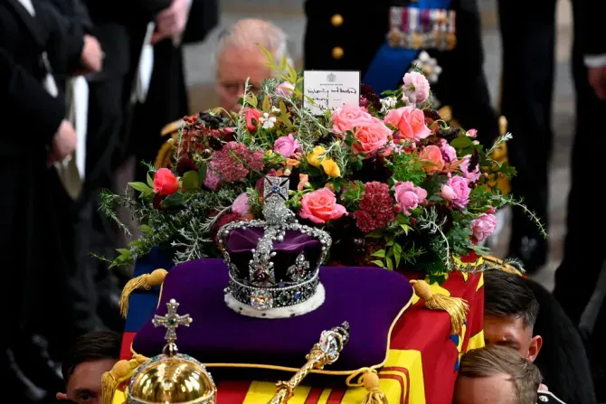 King Charles III walks alongside the coffin carrying Queen Elizabeth II with the Imperial State Crown resting on top as it departs Westminster Abbey during the State Funeral of Queen Elizabeth II on Sept. 19, 2022, in London. Elizabeth II died at Balmoral Castle in Scotland on Sept. 8, 2022, and is succeeded by her eldest son, King Charles III. | Photo by Gareth Cattermole/Getty Images