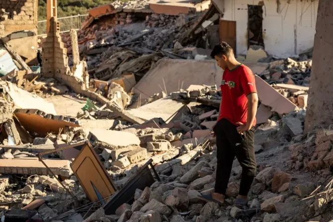 A man looks at the rubble of homes in the village of Talat N’Yaaqoub south of Marrakech in Morocco on Sept. 11, 2023. The quake that struck the country on Sept. 8 killed at least 2,122 people, injured more than 2,400 others, and flattened entire villages. | Credit: FADEL SENNA/AFP via Getty Images
