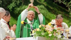 St. John Paul II during an open-air Mass on June 9, 1991, in Warsaw, Poland. | Credit: JANEK SKARZYNSKI/AFP via Getty Images