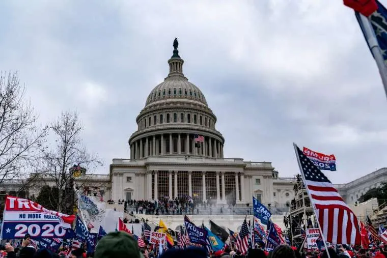 Supporters of US President Donald Trump protest outside the US Capitol, Jan. 6, 2021, in Washington, DC. / Alex Edelman/AFP via Getty Images.