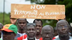 Protestors demonstrate against terrorism in central Ouagadougou on August 19, 2017. / AFP/Getty Images