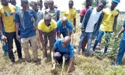Samuel Zan Akologo, the Knights of Marshall Supreme Officer Responsible for MAREDES and Advocacy, planting a seedling. Credit: Business Ghana