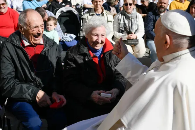 Pope Francis greets an elderly couple at a general audience in St. Peter's Square at the Vatican. / Credit: Vatican Media