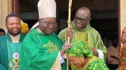 Archbishop Ignatius Kaigama blesses a lady after Holy Mass on 29 January 2023. Credit: Abuja Archdiocese